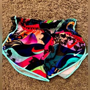 Nike wild print running shorts, fit more like small—never worn